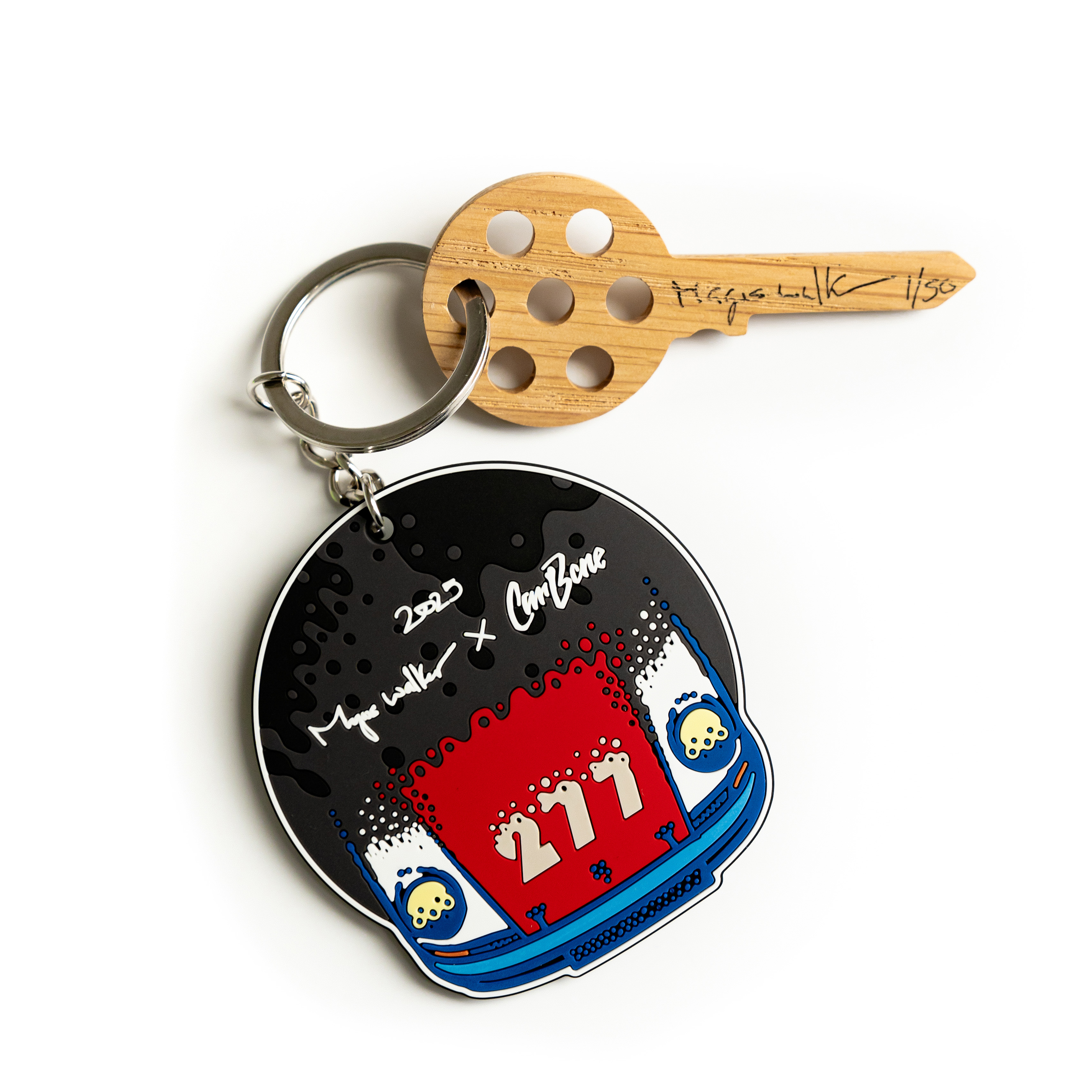 Keychain with a wooden key signed by Magnus | Magnus Walker x CarBone 
							